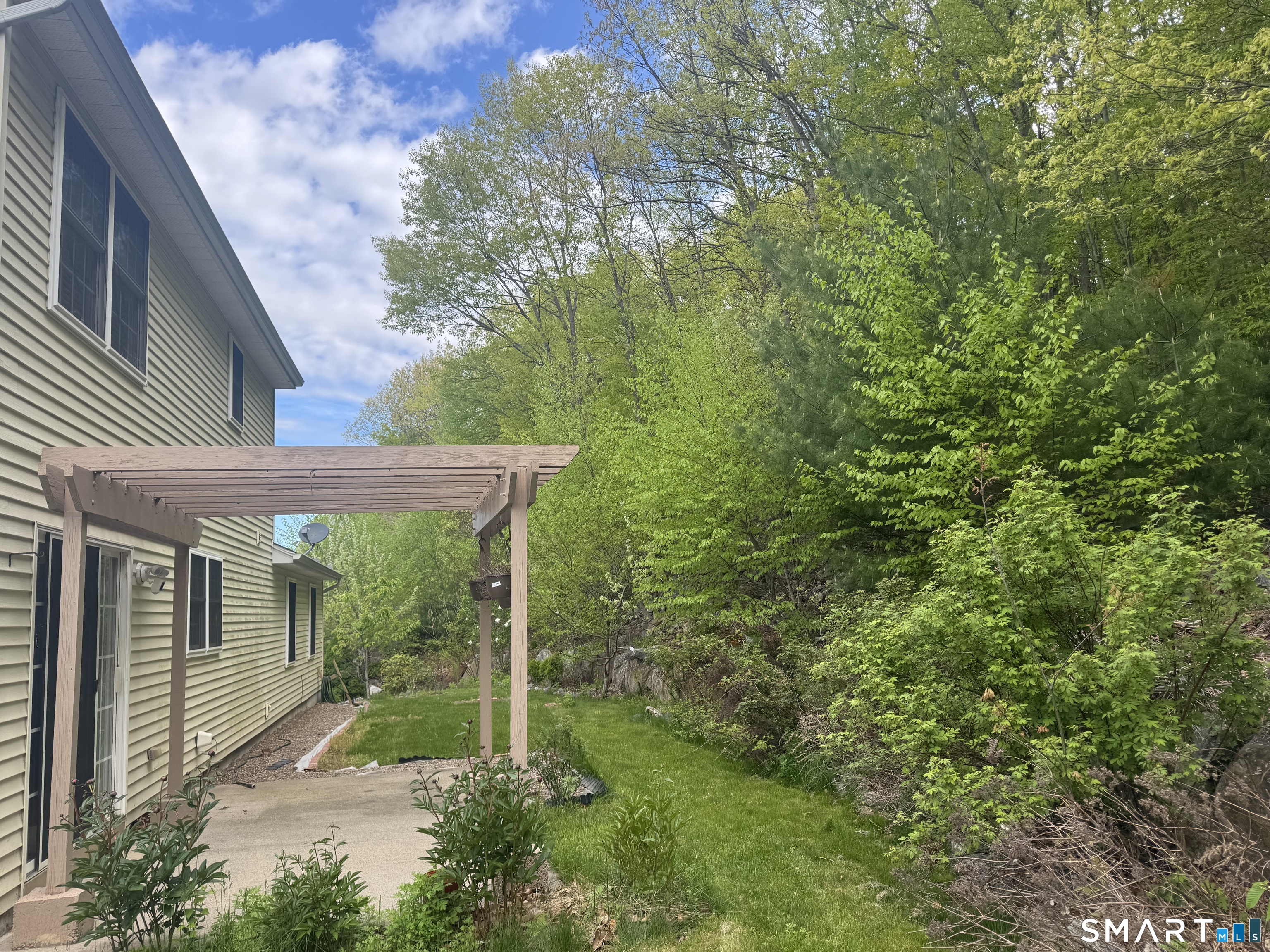 32 Tyler Hill Road Naugatuck, CT 06770 - Photo 25 of 27 a view of backyard with green space