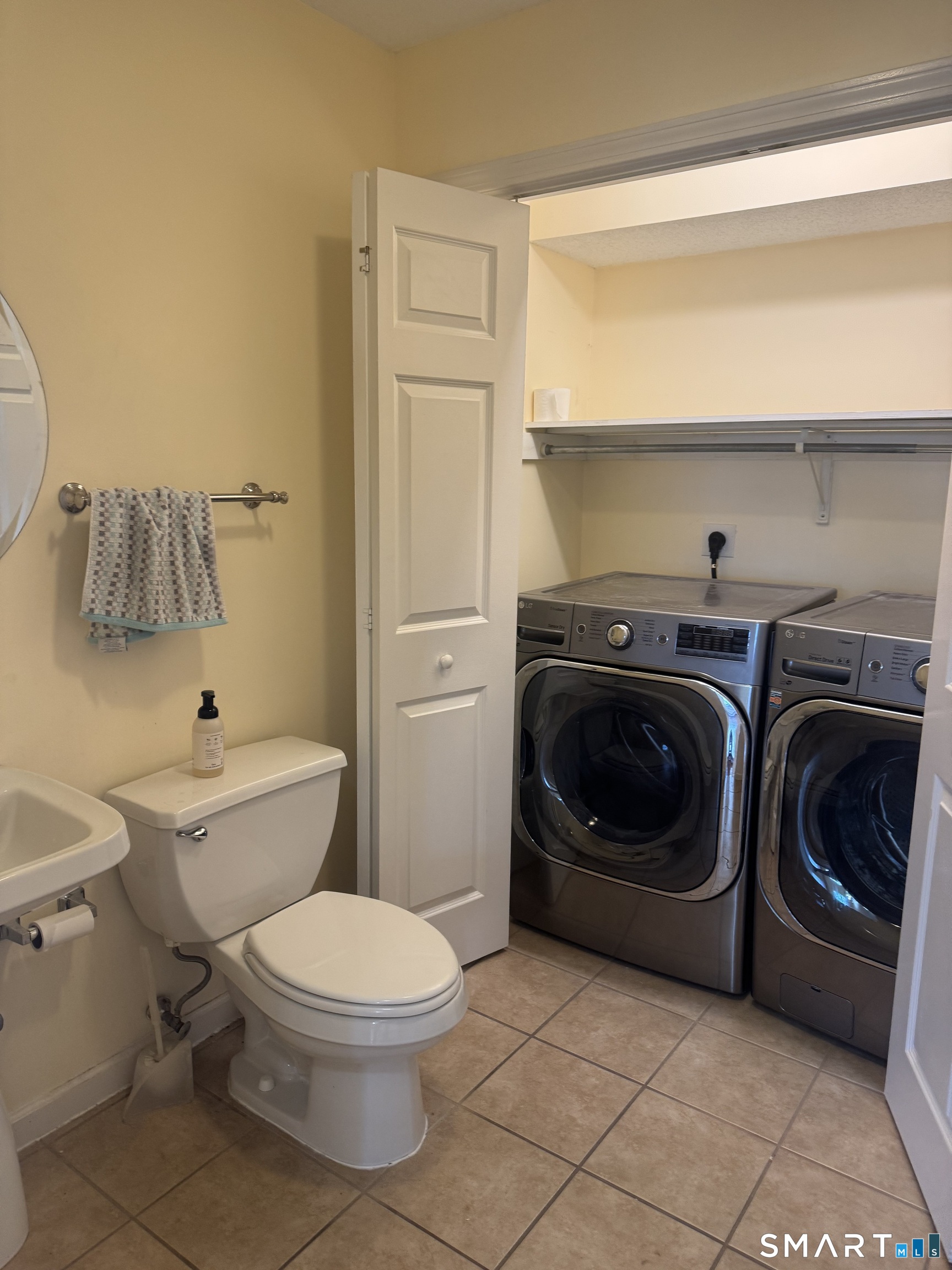 32 Tyler Hill Road Naugatuck, CT 06770 - Photo 27 of 27 a utility room with a washer and dryer