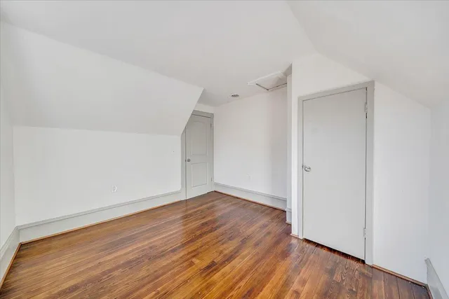 a bathroom with a bathtub a shower and a sink