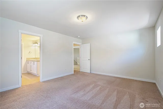 a spacious bathroom with a double vanity sink mirror and double