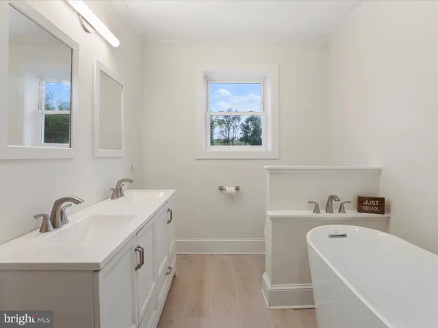 a bathroom with a sink and a bathtub