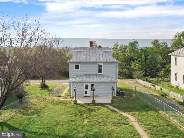 a view of a house with a swimming pool