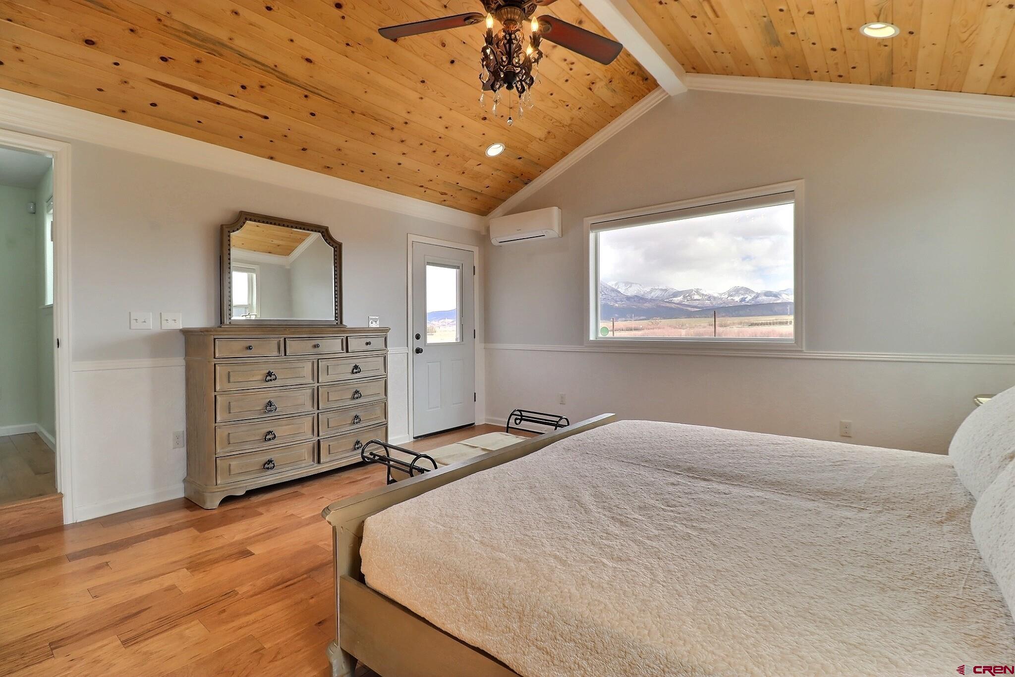 36557 Grandview Mesa Road Crawford, CO 81415 - Photo 18 of 45 a bedroom with furniture and a window