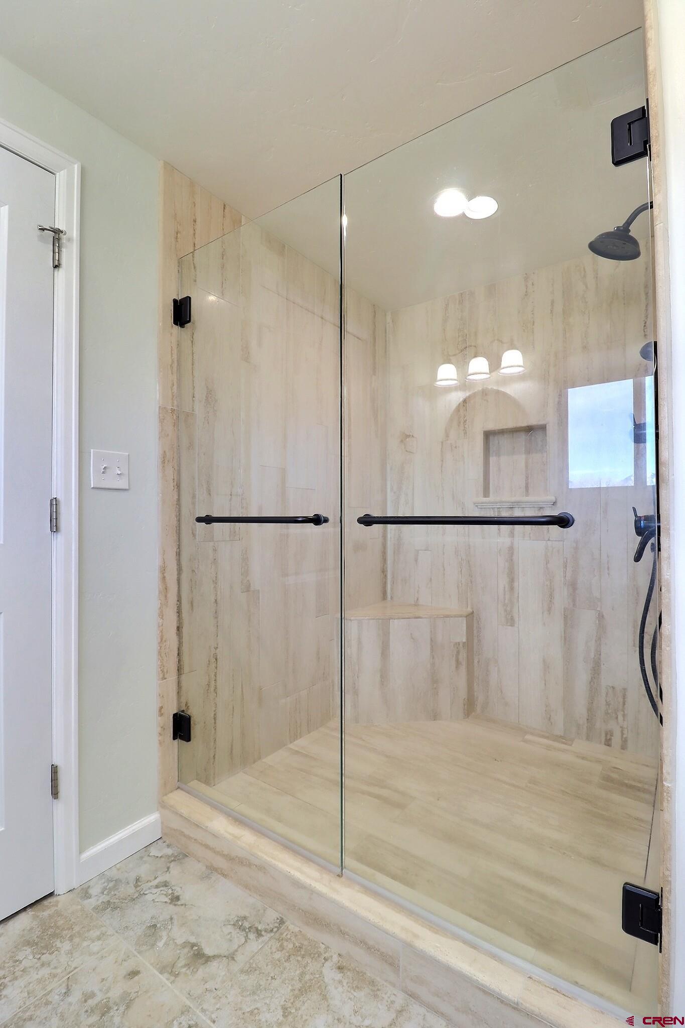 36557 Grandview Mesa Road Crawford, CO 81415 - Photo 21 of 45 a bathroom with a shower