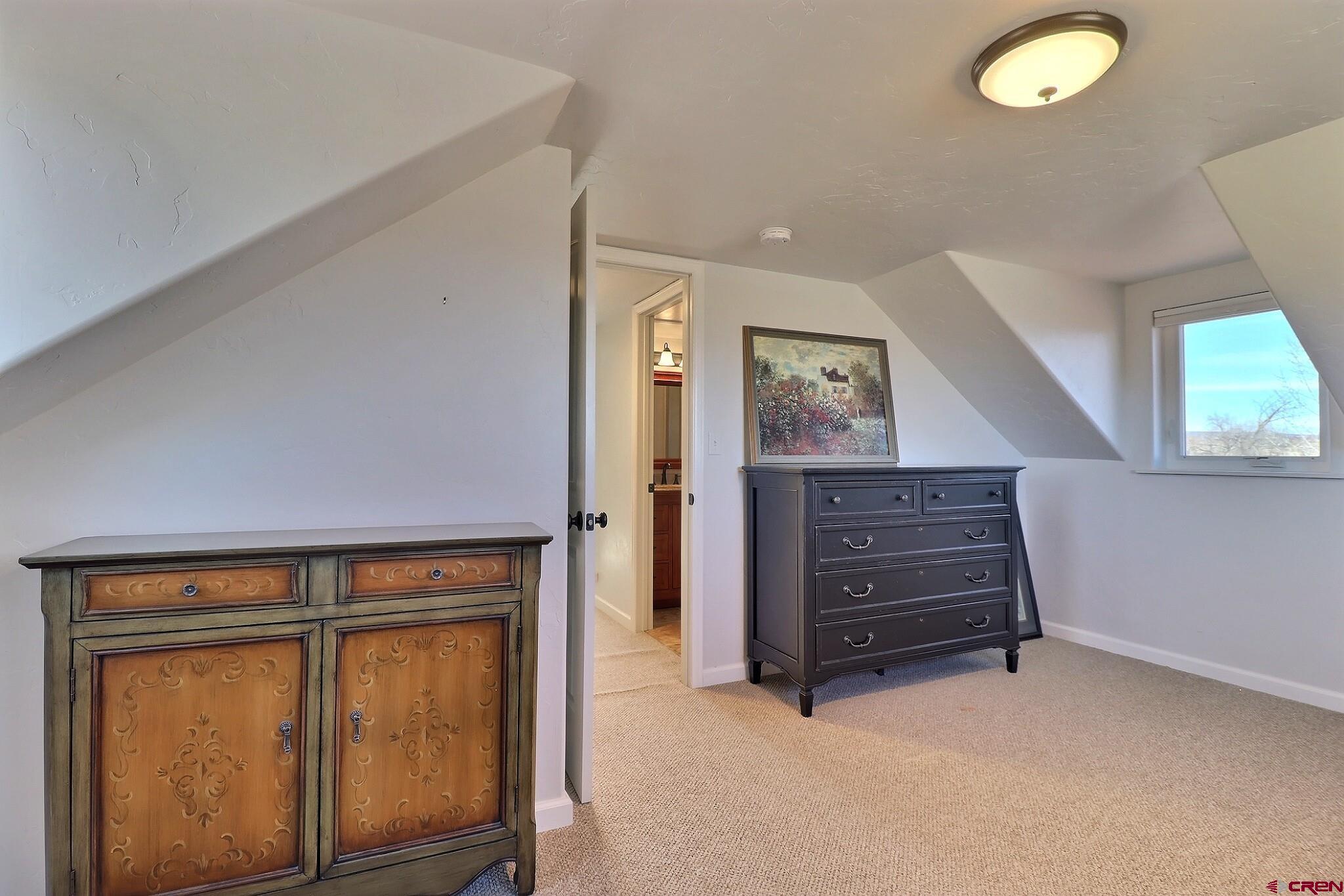 36557 Grandview Mesa Road Crawford, CO 81415 - Photo 23 of 45 a view of a livingroom with furniture and staircase