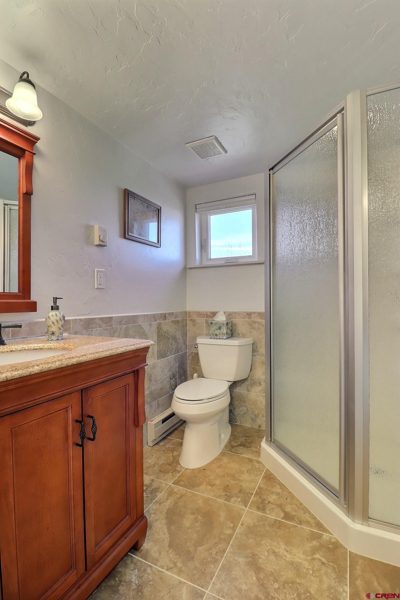36557 Grandview Mesa Road Crawford, CO 81415 - Photo 24 of 45 a bathroom with a sink toilet and shower