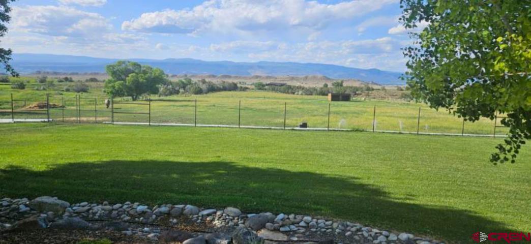 36557 Grandview Mesa Road Crawford, CO 81415 - Photo 32 of 45 a view of a golf course with a garden
