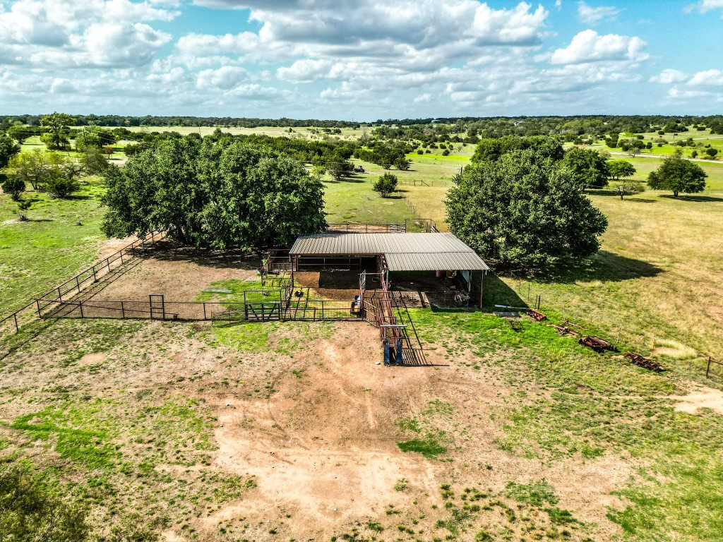 1220 County Road 225 Briggs, TX 78608 - Photo 16 of 36 a view of a yard with an outdoor space