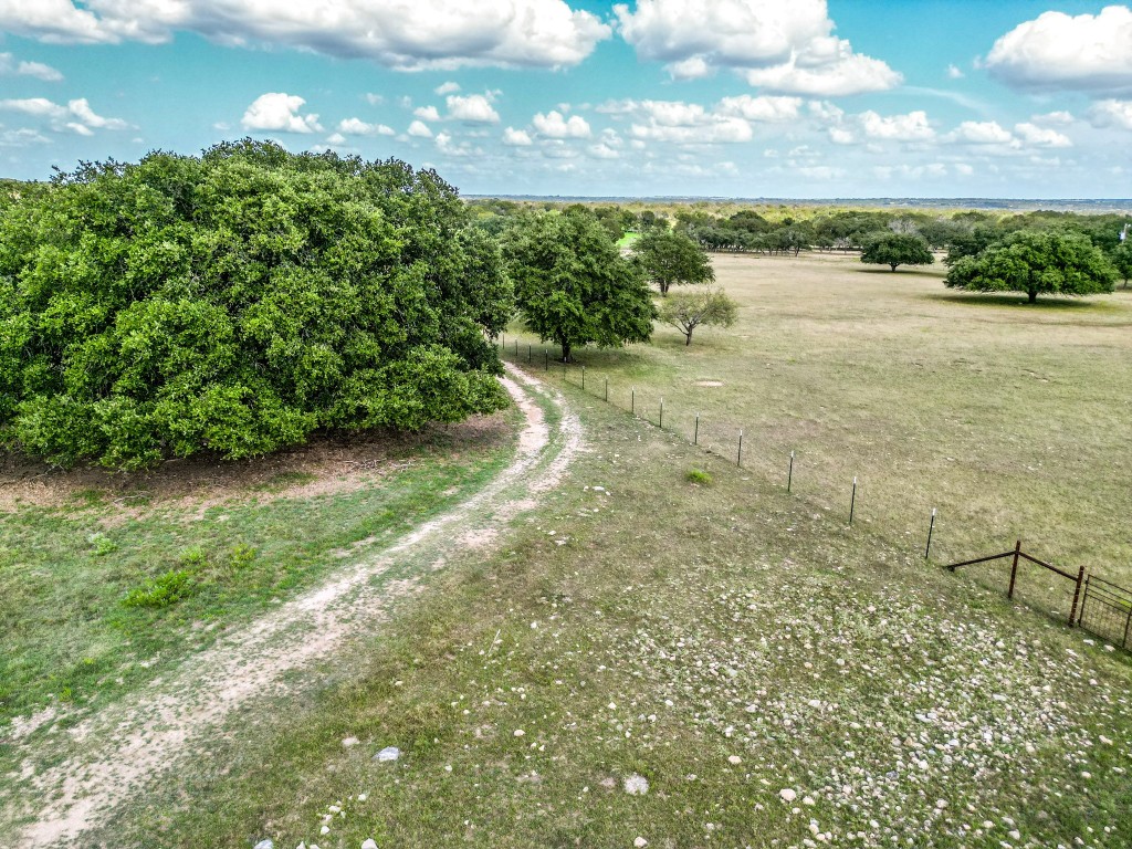 1220 County Road 225 Briggs, TX 78608 - Photo 30 of 36 a view of a lake with a yard