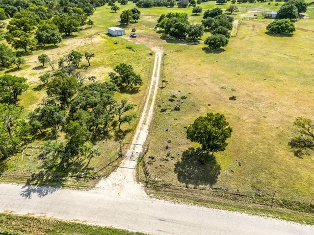 a view of a playground with basketball court