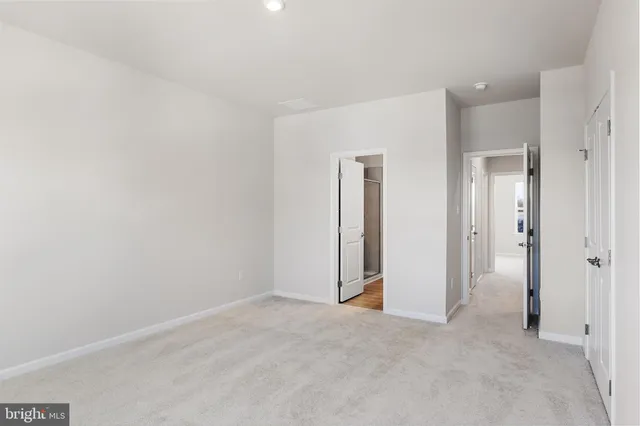 a view of room that has a walk in closet