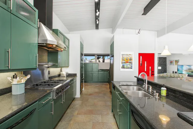 a room with cabinets and a window