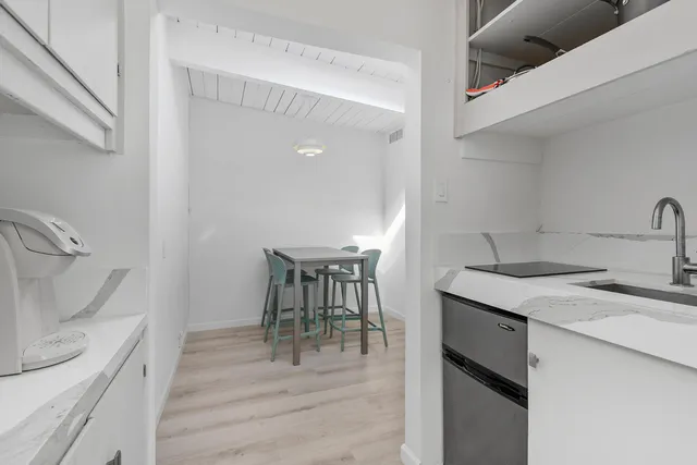 a view of kitchen and sink