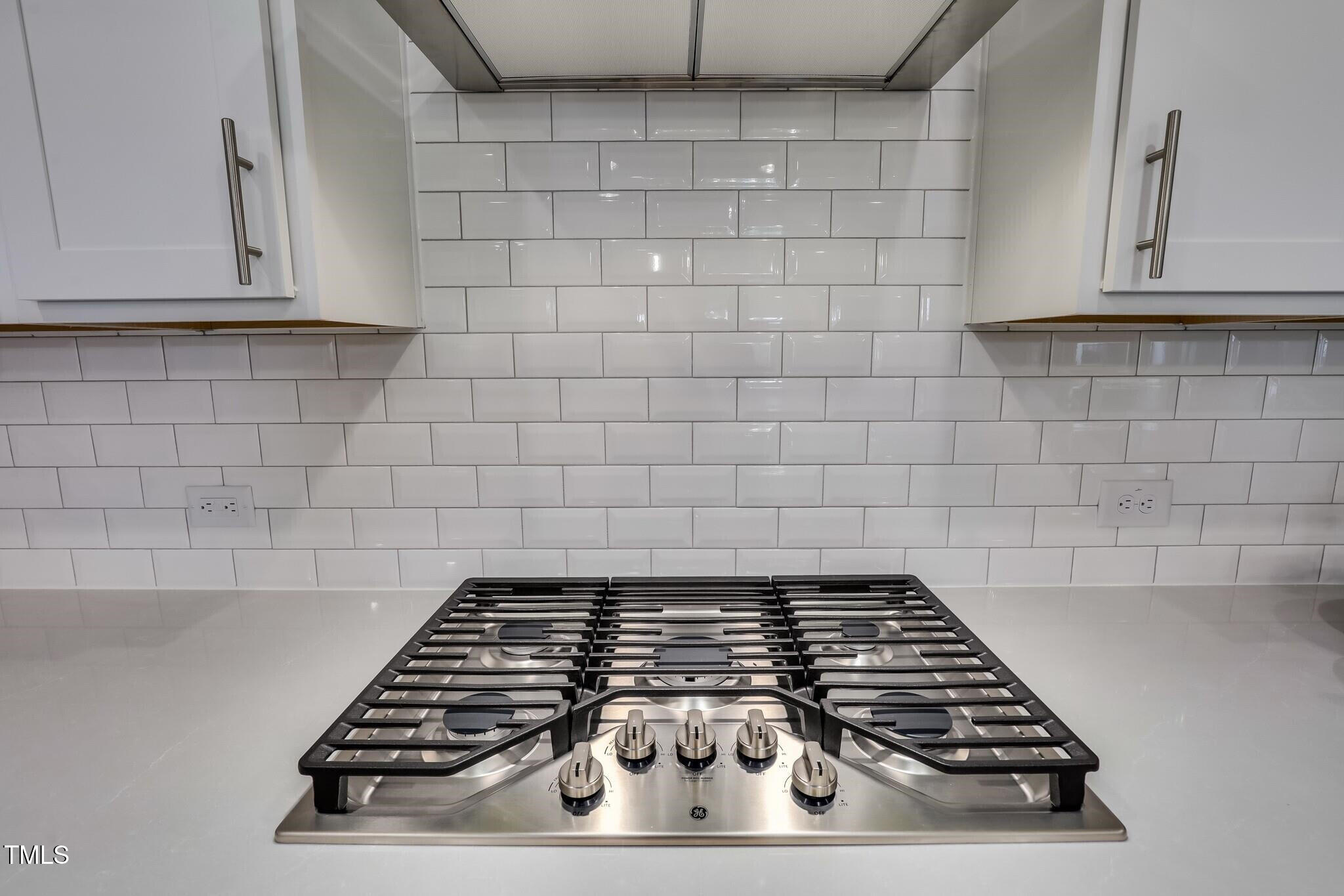 132 Corapeake Way Apex, NC 27539 - Photo 10 of 47 a stove top oven sitting inside of a kitchen