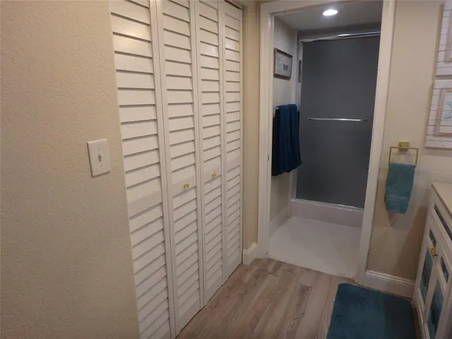 a bedroom with bed and window