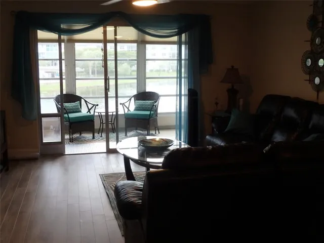 a view of a lake with boats and trees