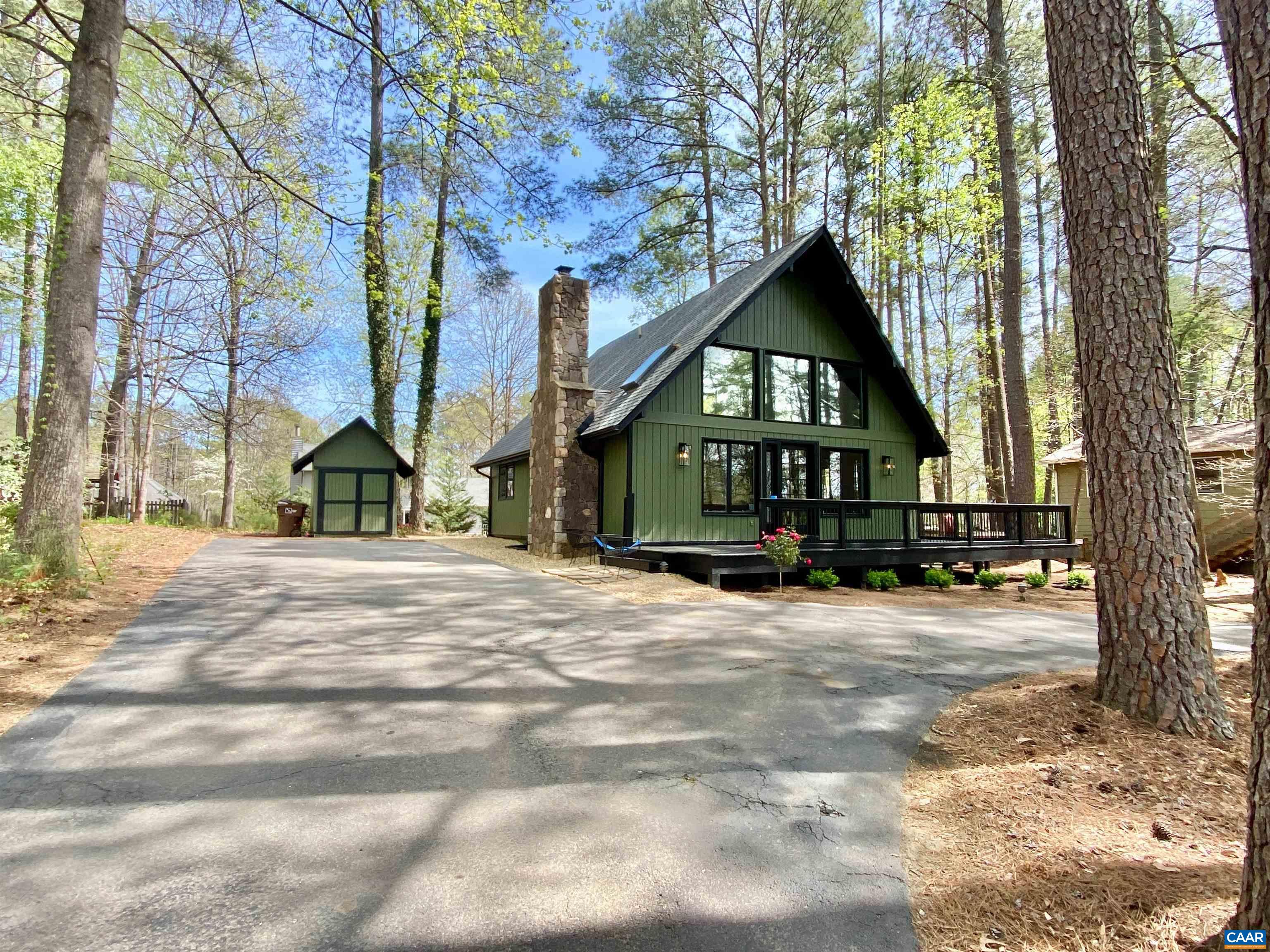 24 Tanglewood Road Palmyra, VA 22963 - Photo 2 of 23 a front view of a house with a yard