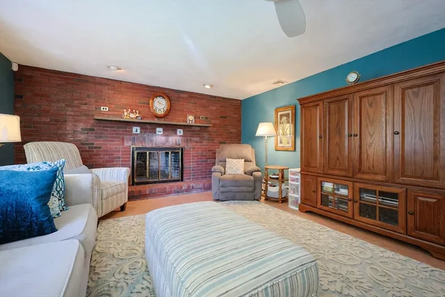 a spacious bedroom with a bed and a dresser