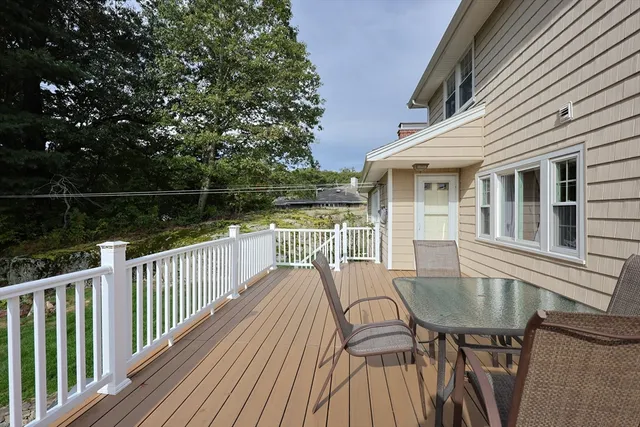 a view of a chairs on the roof deck