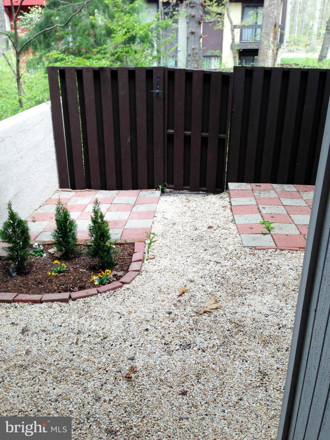 2232 White Cornus Lane Reston, VA 20191 - Photo 15 of 25 a view of a wooden fence