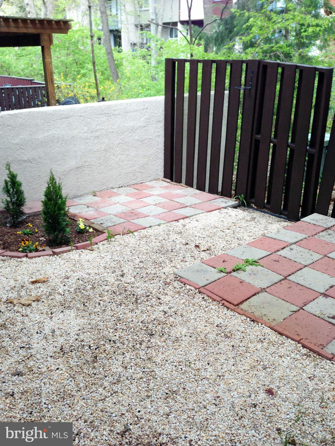 2232 White Cornus Lane Reston, VA 20191 - Photo 16 of 25 a view of small yard with wooden fence