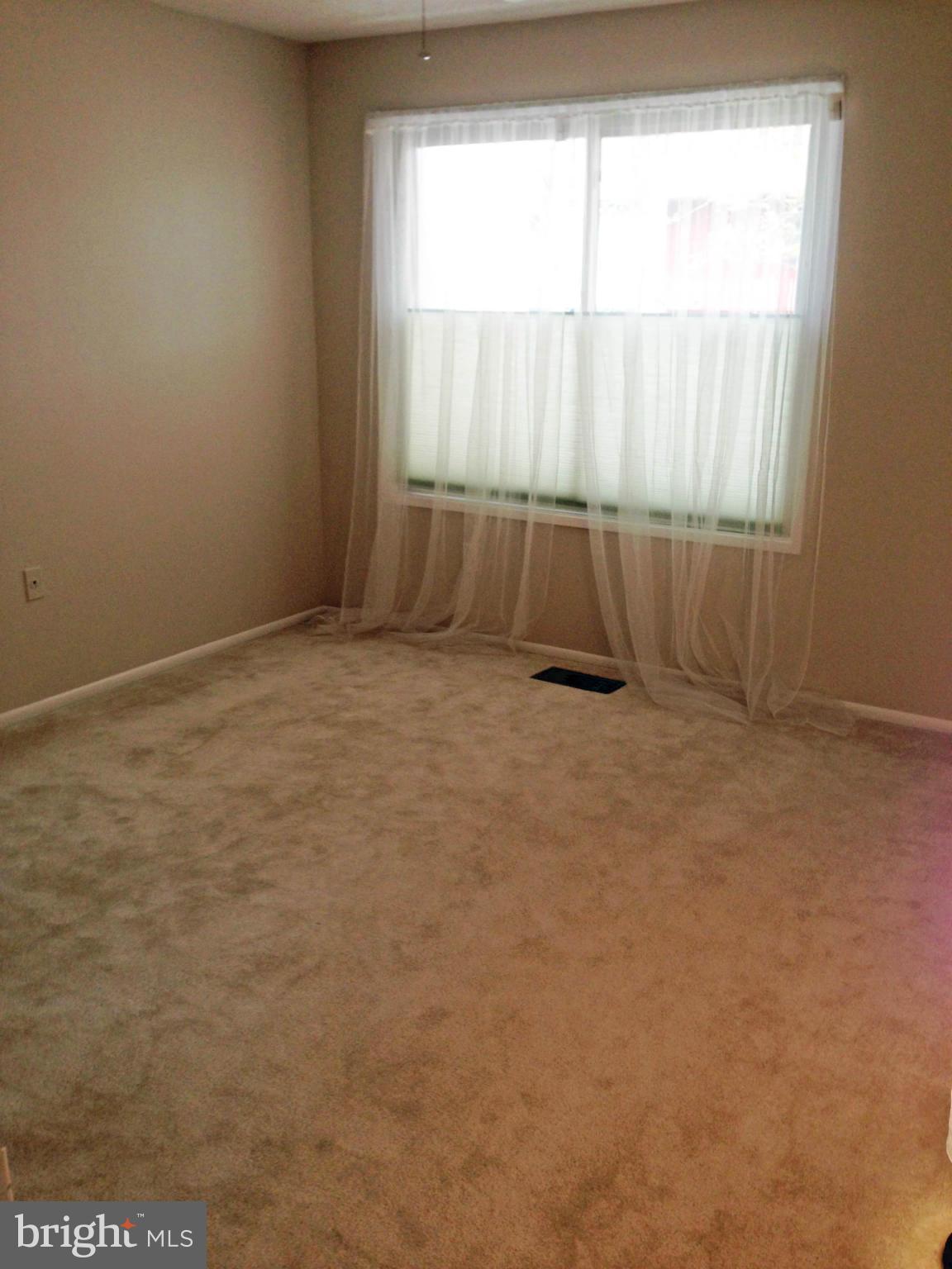 2232 White Cornus Lane Reston, VA 20191 - Photo 23 of 25 an empty room with a window