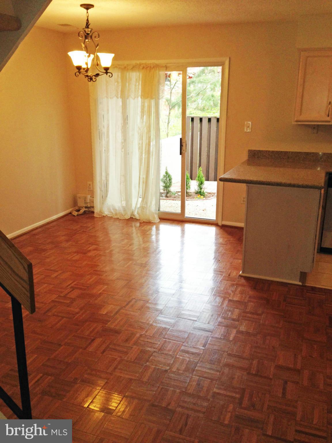2232 White Cornus Lane Reston, VA 20191 - Photo 7 of 25 a view of an empty room with a window