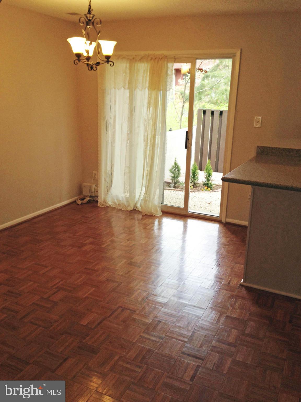 2232 White Cornus Lane Reston, VA 20191 - Photo 8 of 25 a view of a livingroom with a hardwood floor