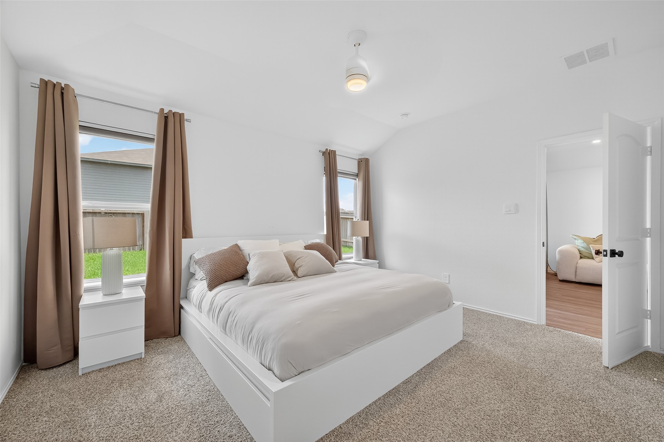 24422 Oriole Summit Drive Spring, TX 77373 - Photo 14 of 20 a bedroom with a bed and a large window