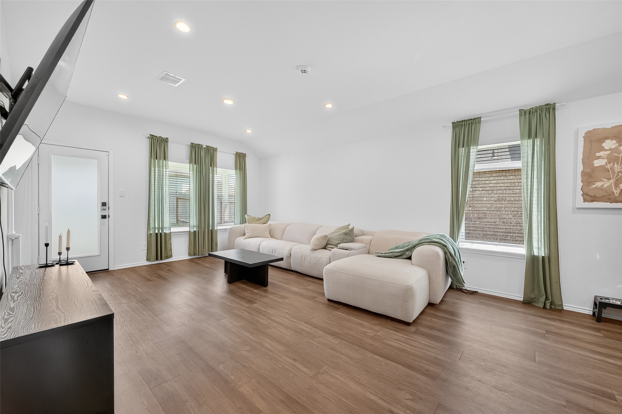 24422 Oriole Summit Drive Spring, TX 77373 - Photo 3 of 20 a living room with furniture and wooden floor