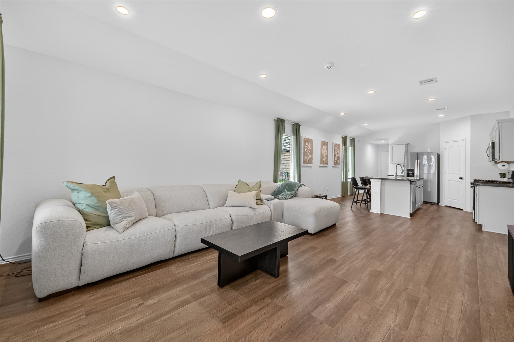 24422 Oriole Summit Drive Spring, TX 77373 - Photo 4 of 20 a living room with furniture and a wooden floor