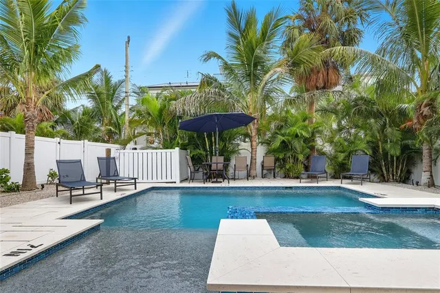 a view of a backyard with a patio