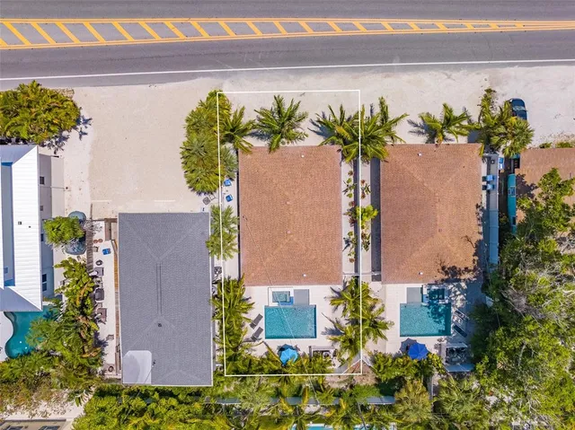 a view of a flower in front of a building