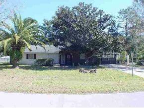 10383 Southwest 81st Terrace Road Ocala, FL 34481 - Photo 1 of 1 a house view with a outdoor space