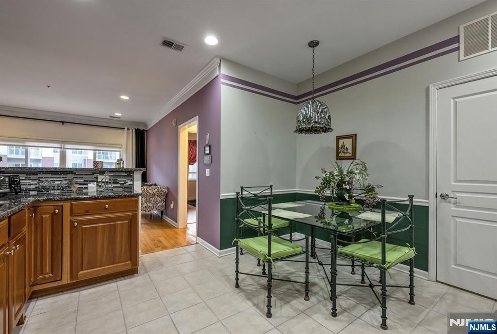 4203 Warren's Way Wanaque, NJ 07465 - Photo 13 of 35 a kitchen with stainless steel appliances granite countertop sink and cabinets