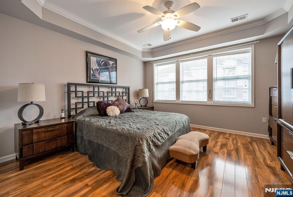 4203 Warren's Way Wanaque, NJ 07465 - Photo 16 of 35 a bedroom with a bed and wooden floor