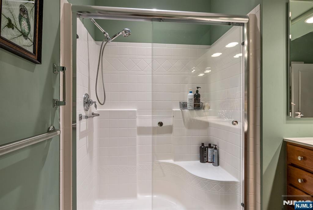 4203 Warren's Way Wanaque, NJ 07465 - Photo 19 of 35 a bathroom with a shower and a sink