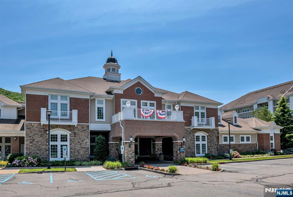 4203 Warren's Way Wanaque, NJ 07465 - Photo 24 of 35 a front view of a building with parking space and parking
