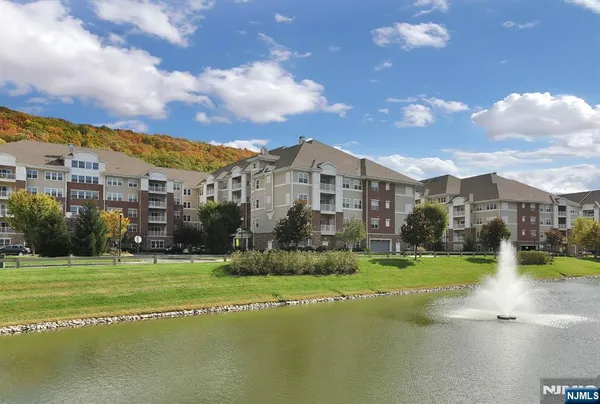 a view of a lake with houses