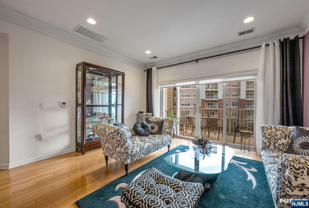 4203 Warren's Way Wanaque, NJ 07465 - Photo 9 of 35 a living room with furniture and a floor to ceiling window