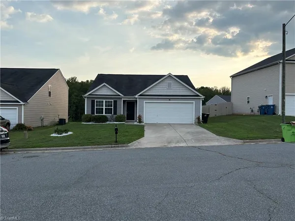 $312,000 | 6612 Glenville Drive, Whitsett, NC 27377