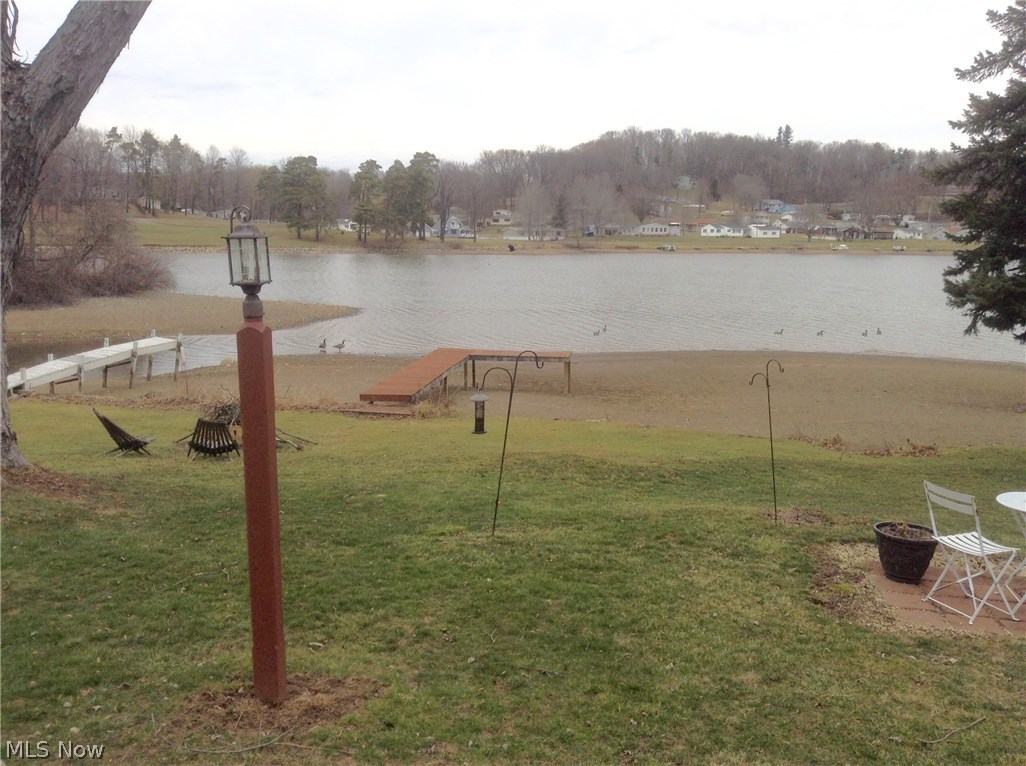 6580 Lakeview Road Hanoverton, OH 44423 - Photo 28 of 35 View of lake and "L" shaped brown dock