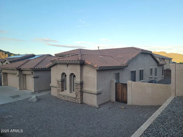 a house view with a garden space