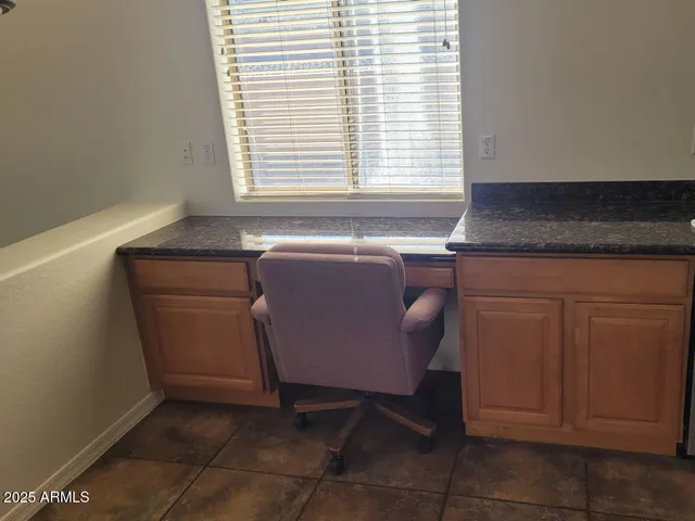 a room with cabinets and window