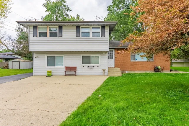 a house view with a garden space