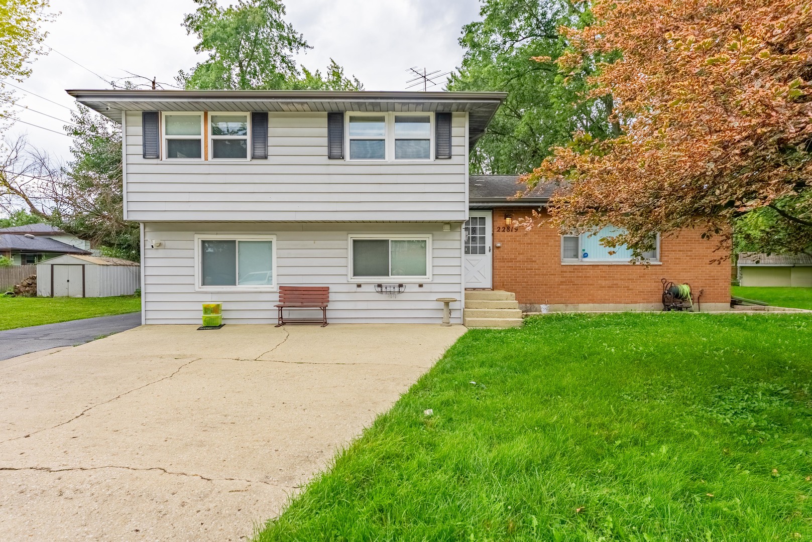 a house view with a garden space