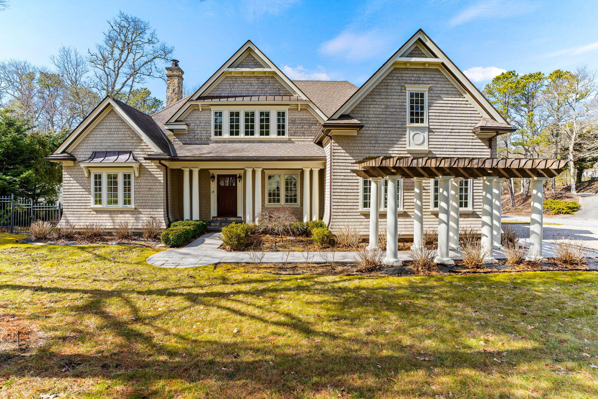 a front view of a house with a yard