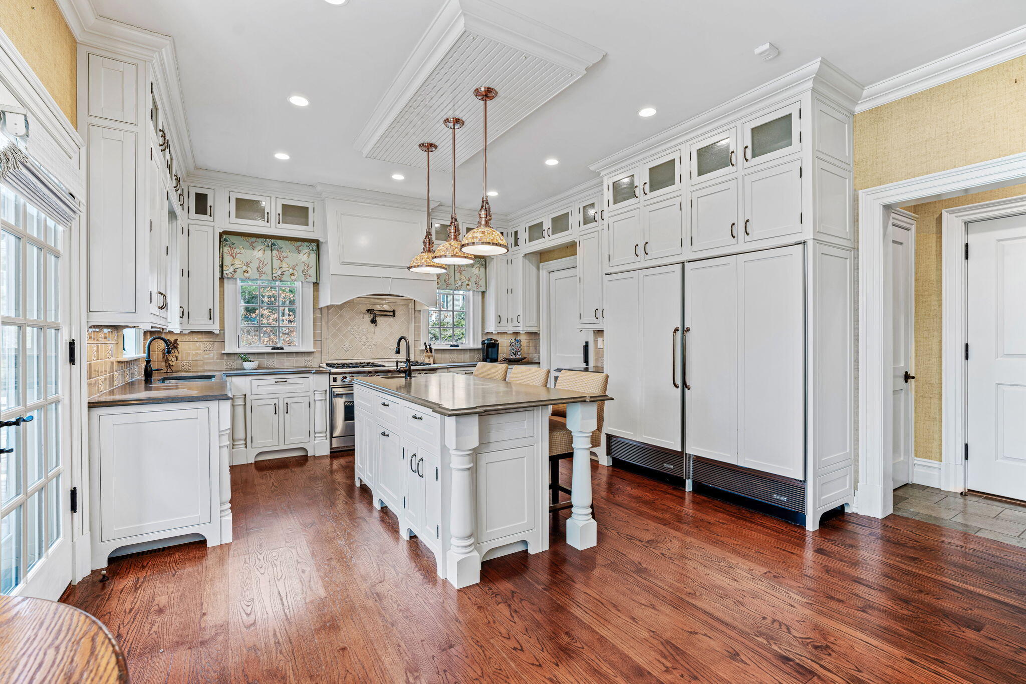 4 Vale Lane Mashpee, MA 02649 - Photo 12 of 33 a kitchen with white cabinets and white appliances