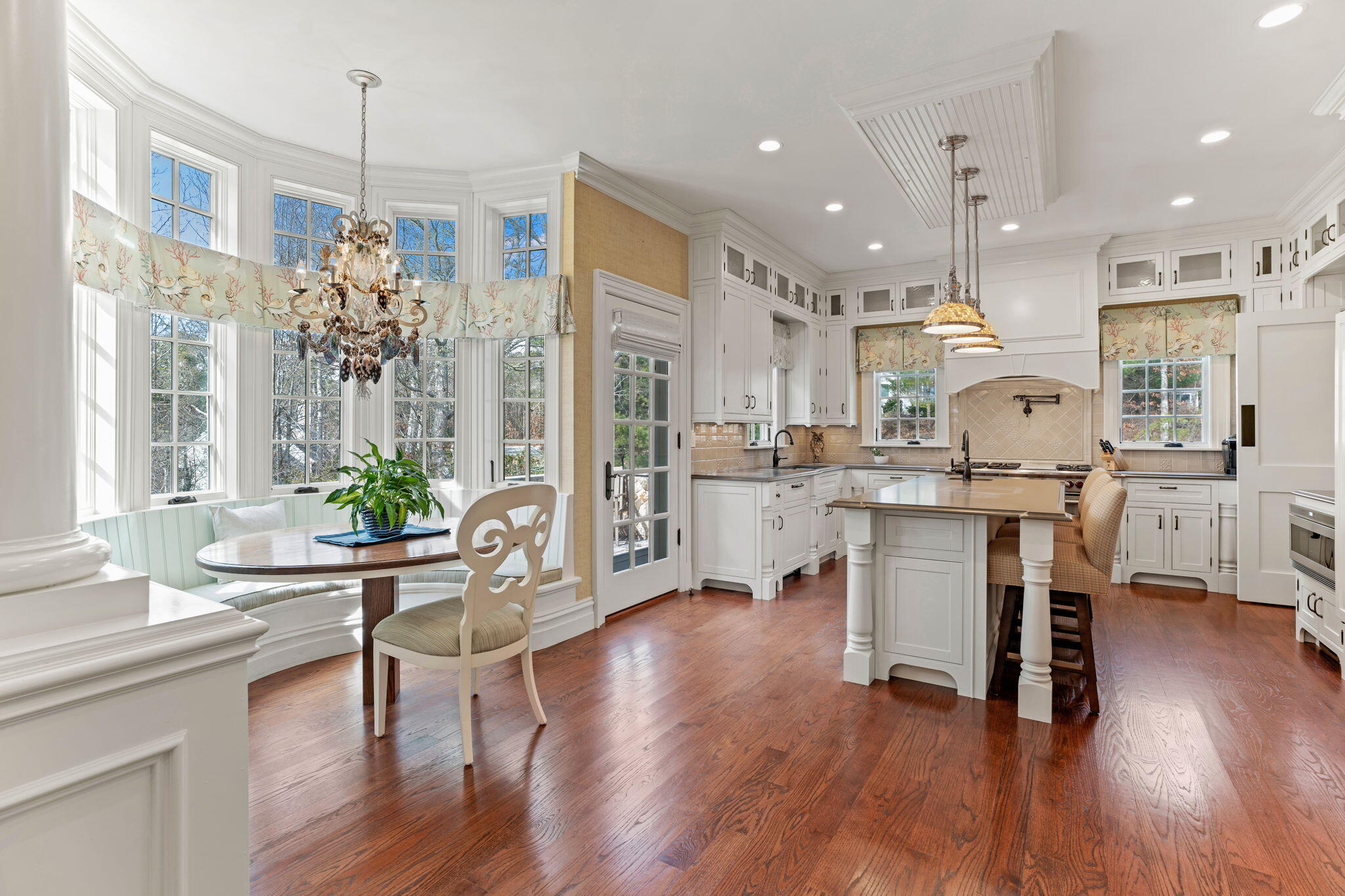 4 Vale Lane Mashpee, MA 02649 - Photo 13 of 33 a room with stainless steel appliances kitchen island granite countertop furniture and a wooden floor