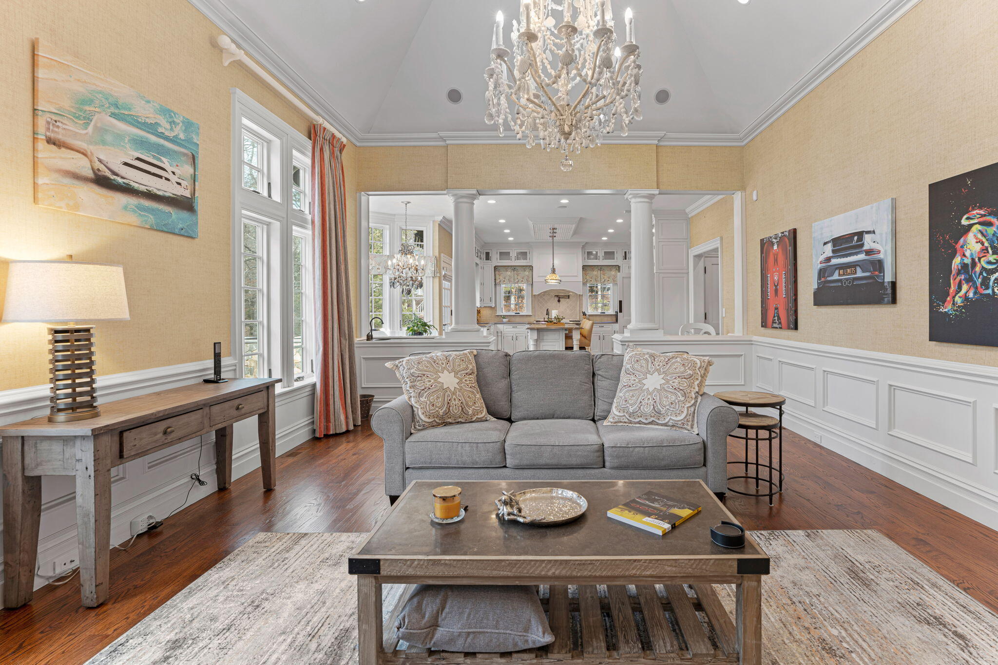 4 Vale Lane Mashpee, MA 02649 - Photo 14 of 33 a living room with furniture a chandelier and a dining table
